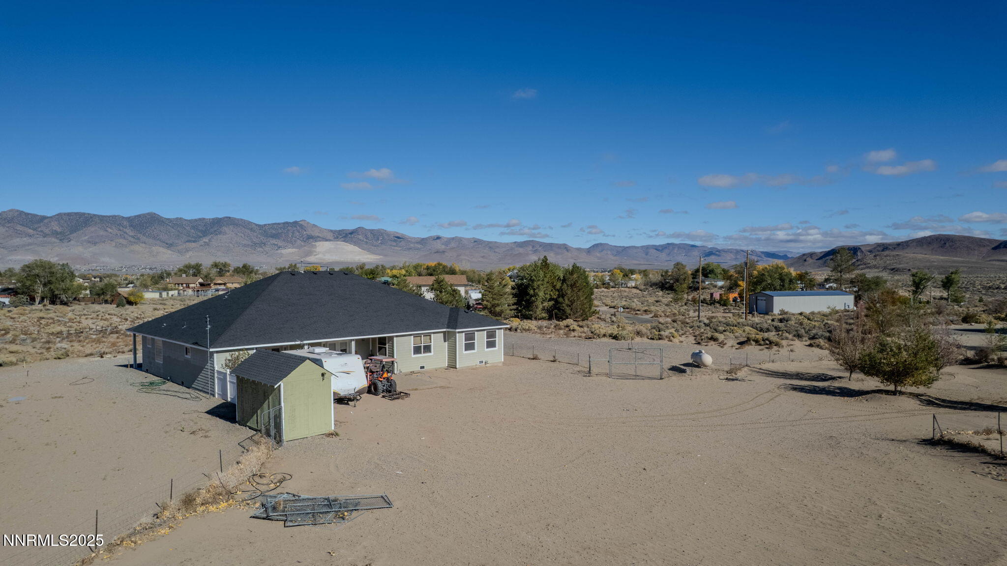275 Imperial Road Dayton, NV 89403 - Photo 45 of 53 a view of a house with a ocean beach