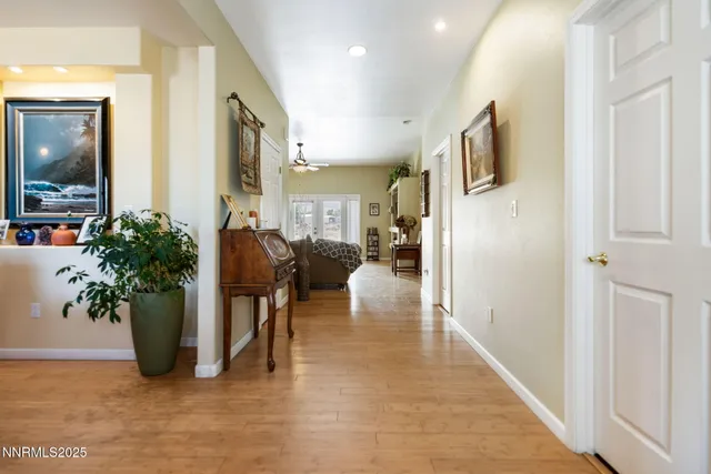 a view of entryway with wooden floor