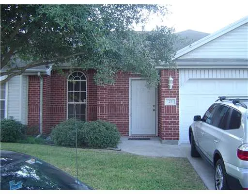 a house view with a backyard space