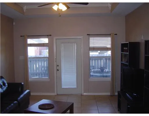 a view of livingroom with furniture and front door