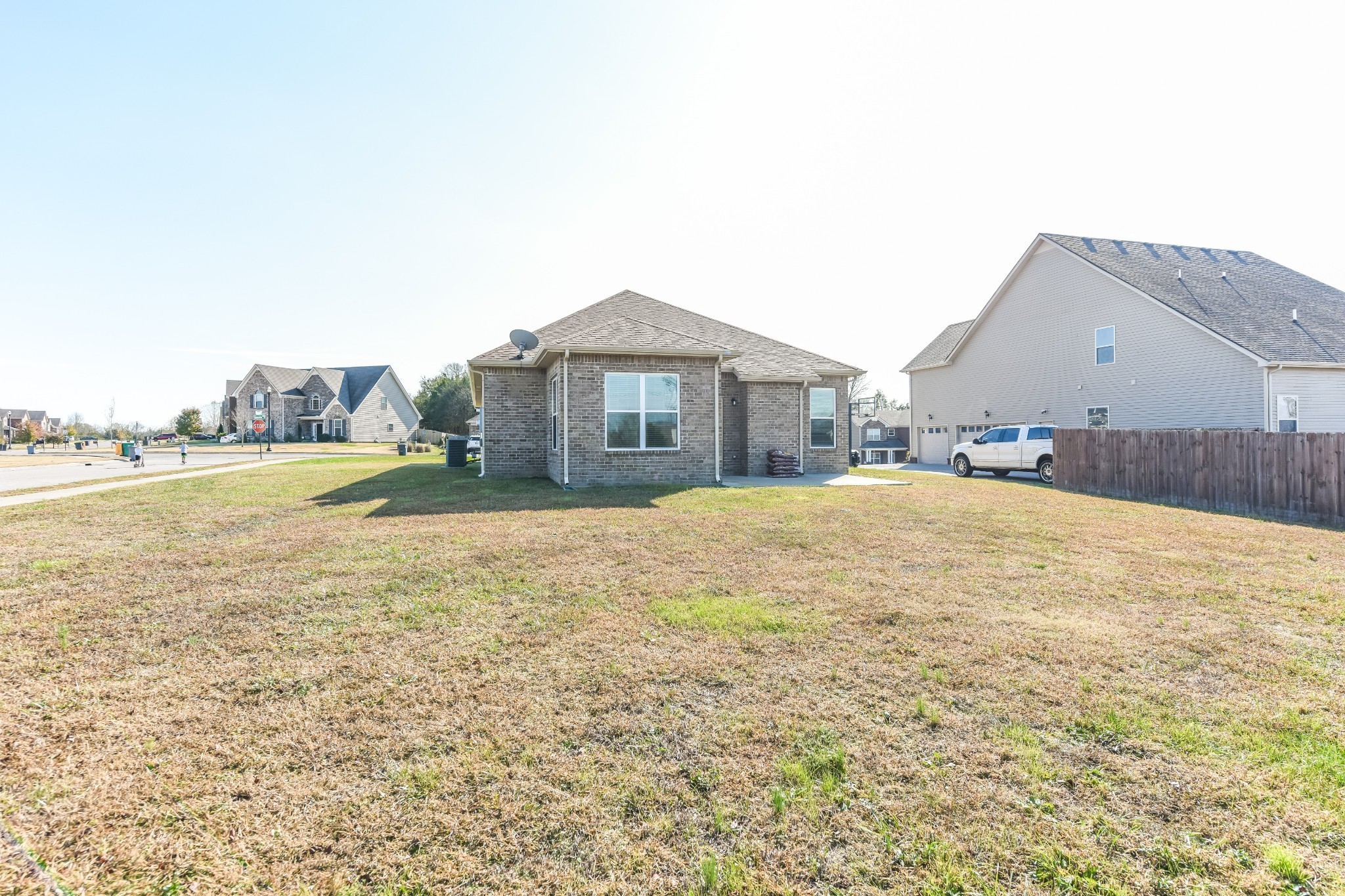 2015 Lincoln Road Spring Hill, TN 37174 - Photo 14 of 17 a view of a house with a yard and a large tree