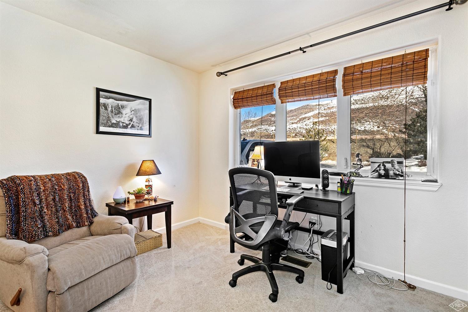 13 Eagle Drive, Unit B Avon, CO 81620 - Photo 20 of 25 a workspace with furniture and a window