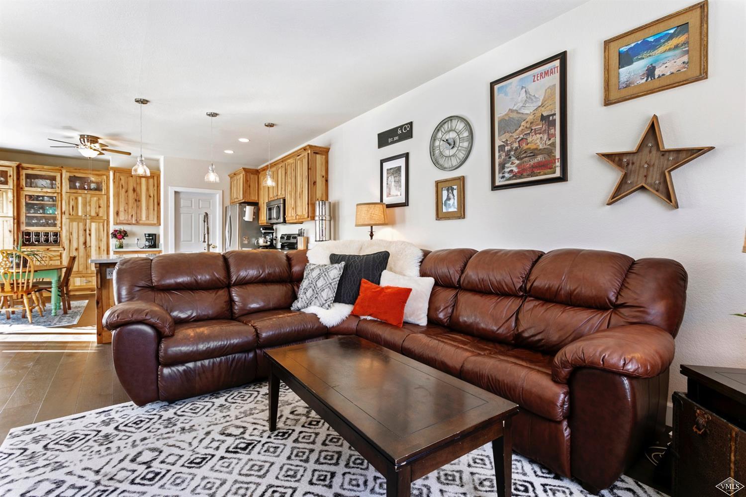13 Eagle Drive, Unit B Avon, CO 81620 - Photo 6 of 25 a living room with furniture and a rug