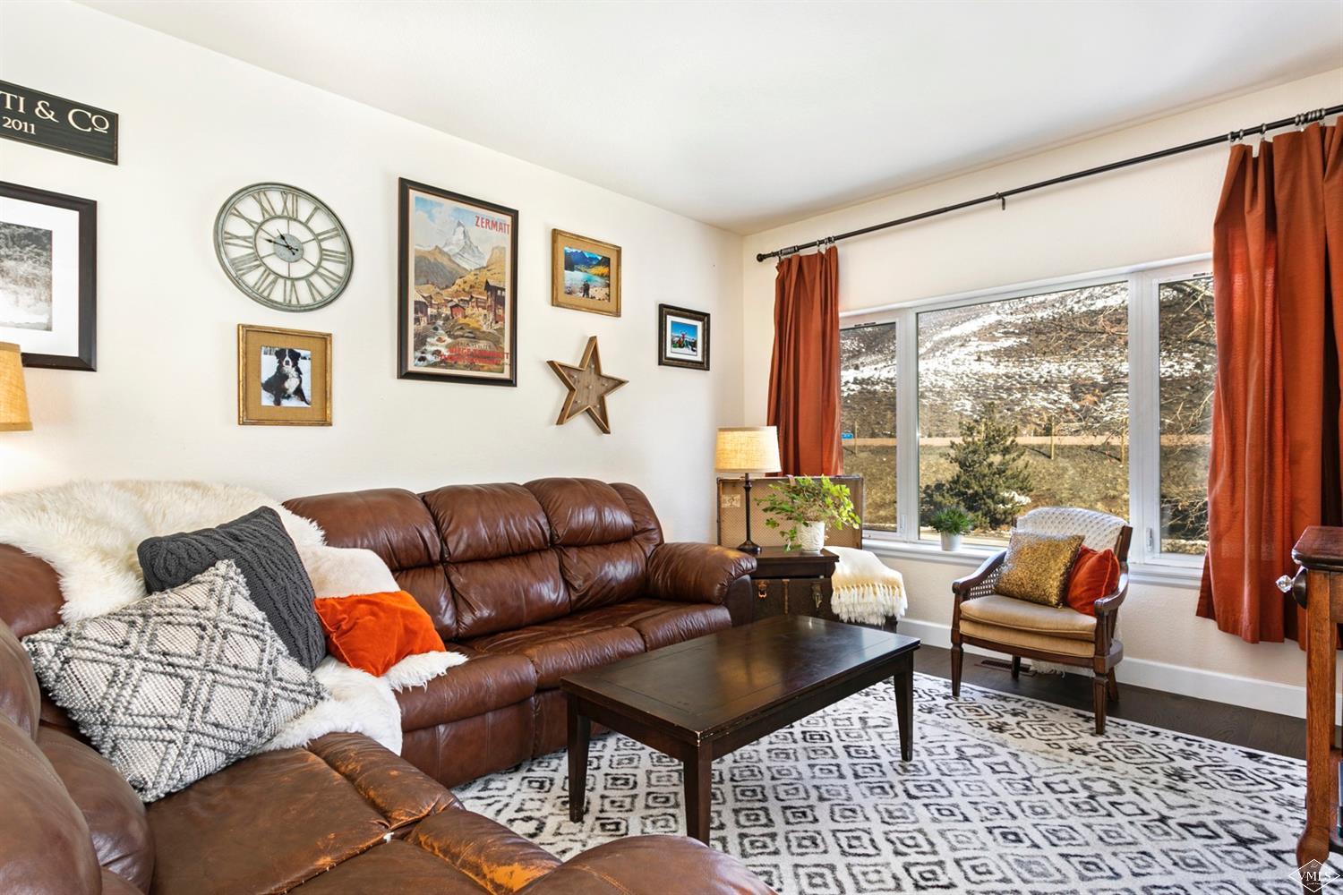 13 Eagle Drive, Unit B Avon, CO 81620 - Photo 7 of 25 a living room with furniture and a large window