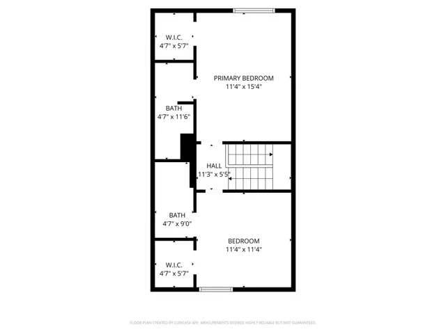 a picture of a bench in front of a wall