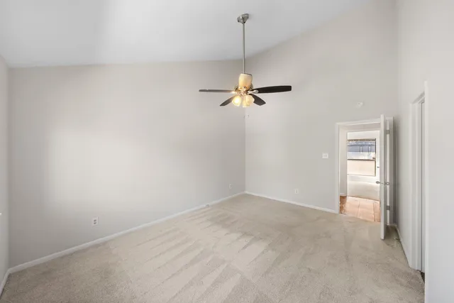 a view of empty room with windows