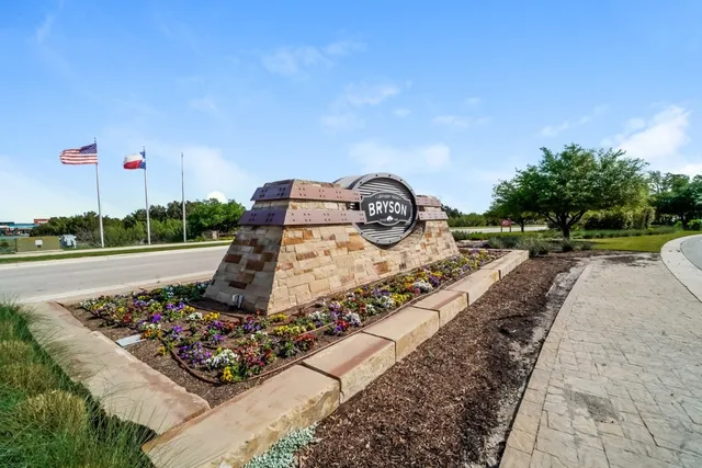 a view of a garden with a car park side of the road