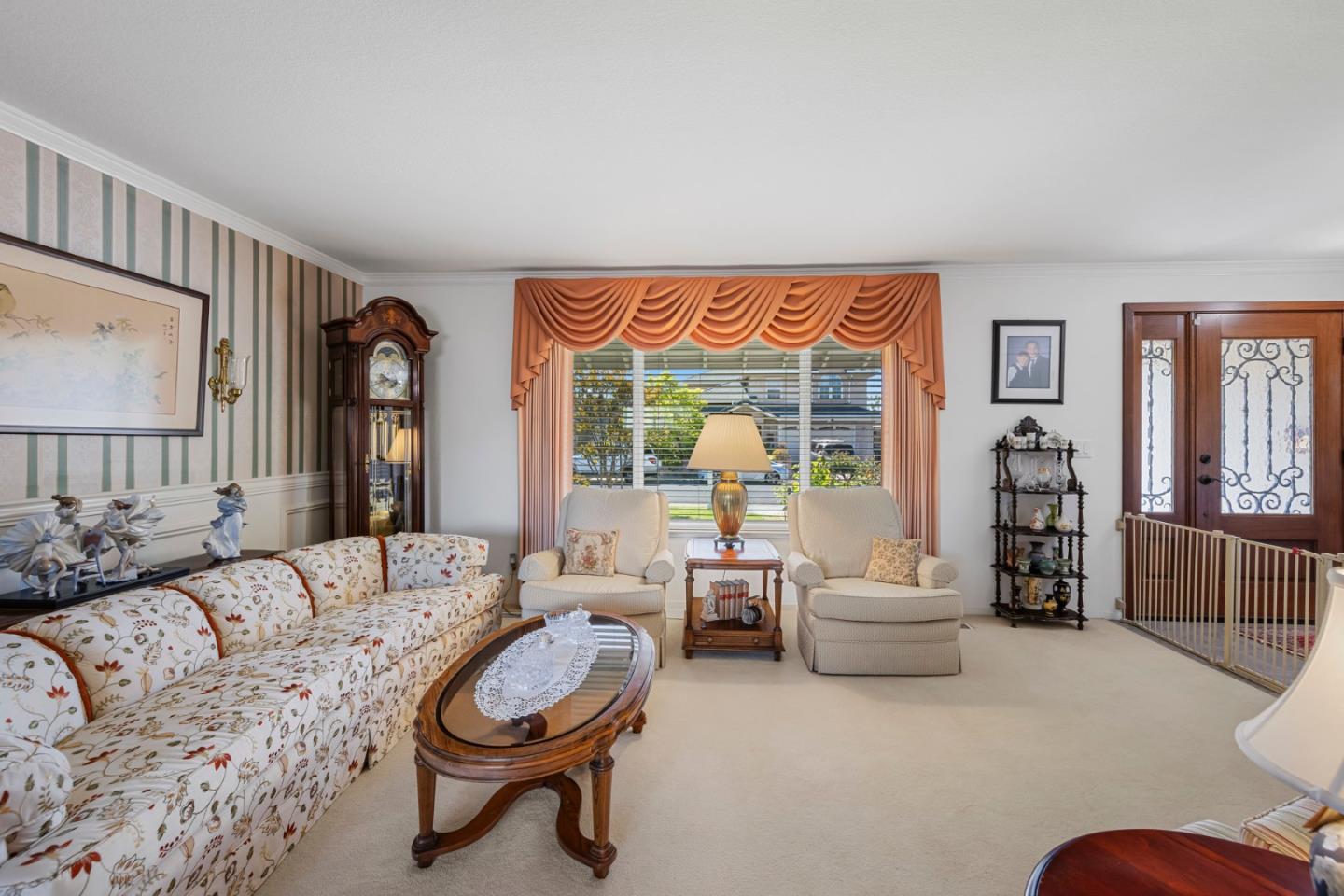 1272 Stardust Way Milpitas, CA 95035 - Photo 11 of 61 a living room with furniture and a large window