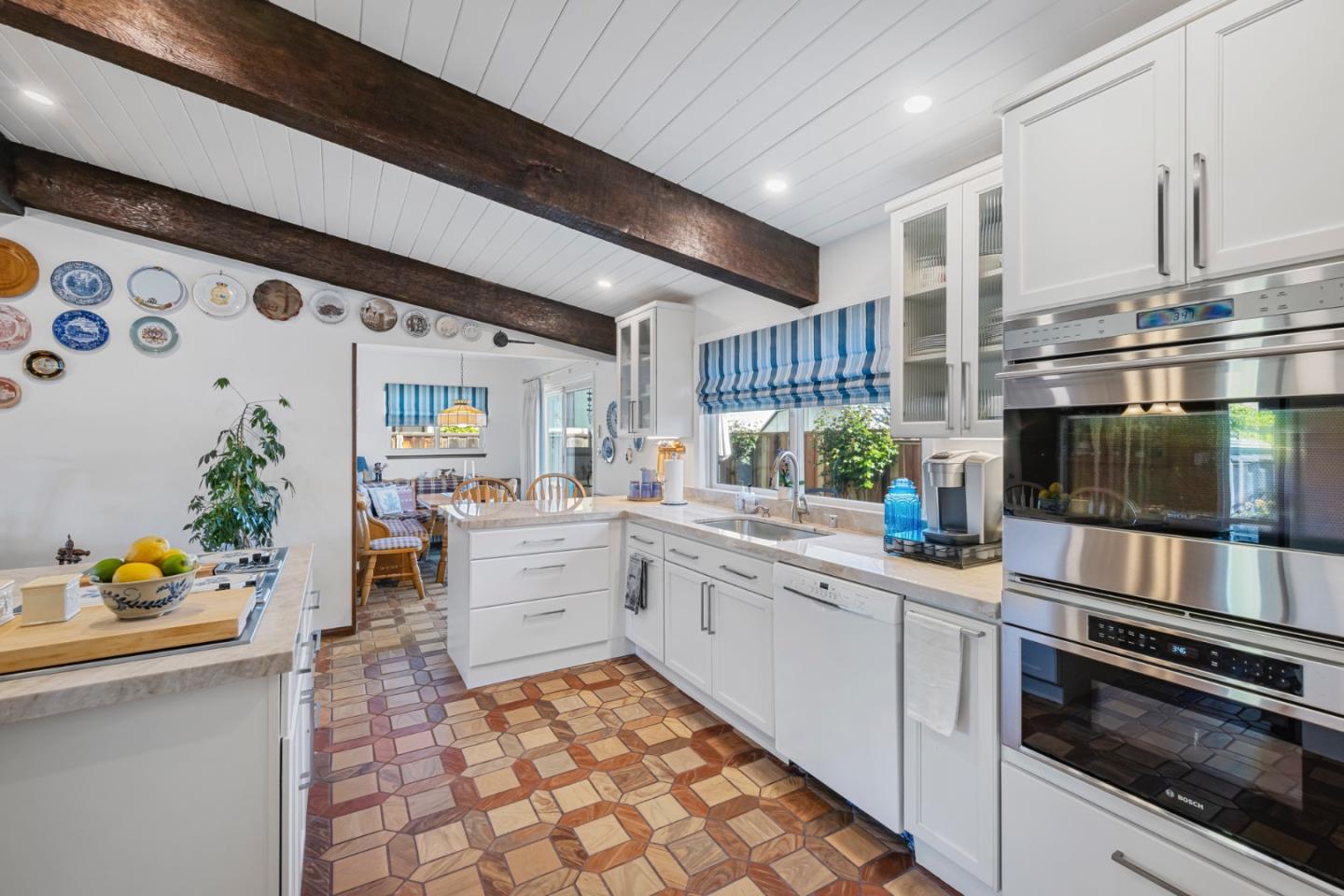 1272 Stardust Way Milpitas, CA 95035 - Photo 16 of 61 a kitchen with a sink stove and cabinets