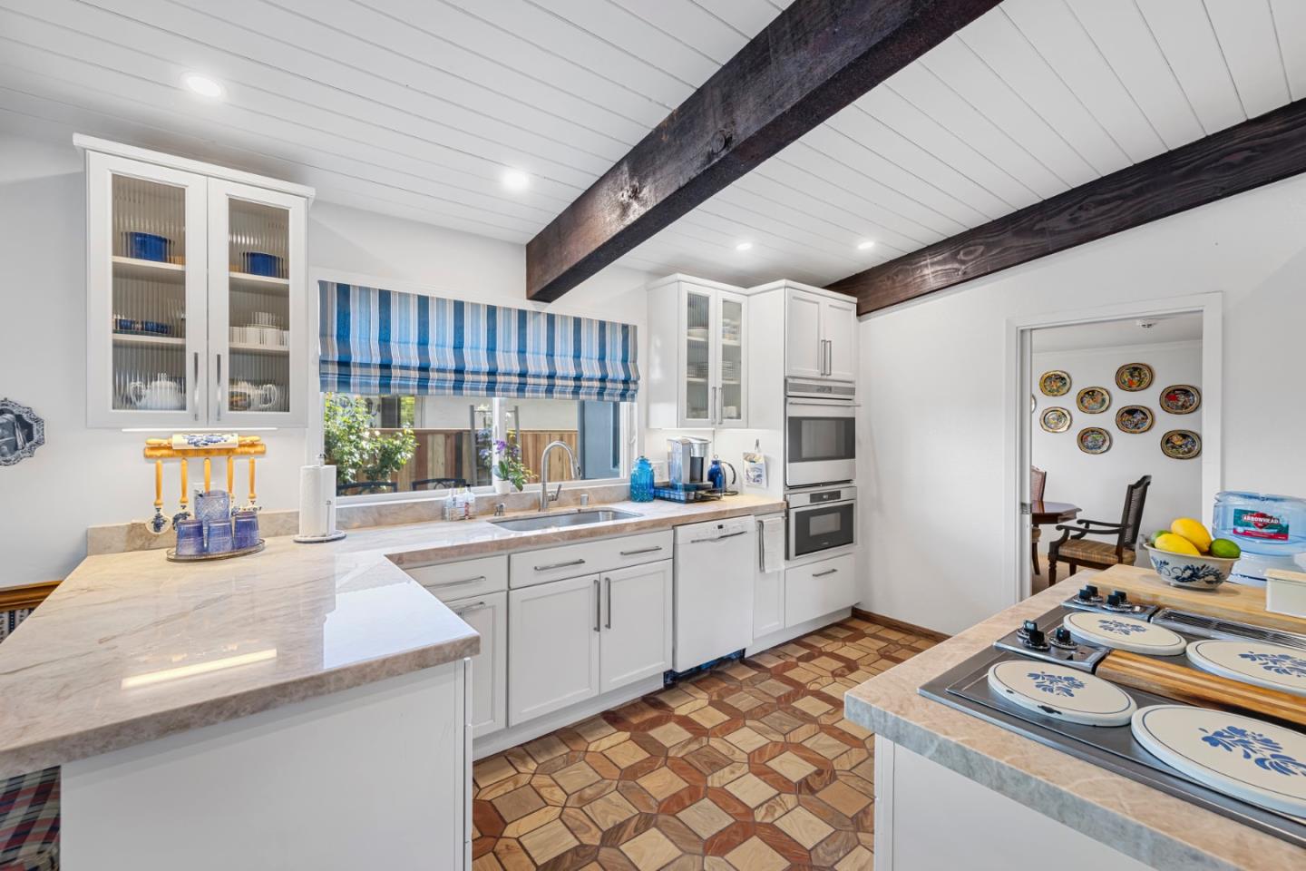 1272 Stardust Way Milpitas, CA 95035 - Photo 21 of 61 a kitchen with stainless steel appliances granite countertop a sink stove and cabinets