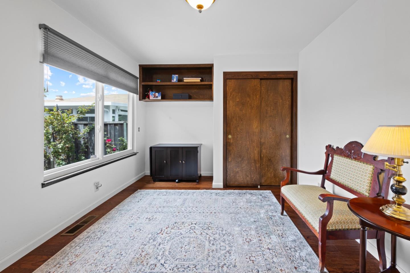 1272 Stardust Way Milpitas, CA 95035 - Photo 27 of 61 a living room with furniture and a fireplace