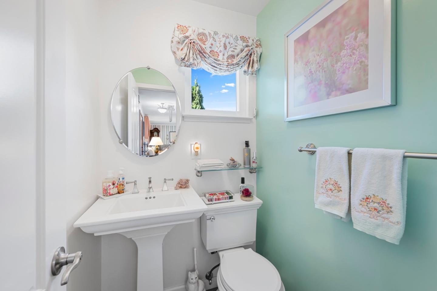 1272 Stardust Way Milpitas, CA 95035 - Photo 35 of 61 a bathroom with a sink mirror and toilet