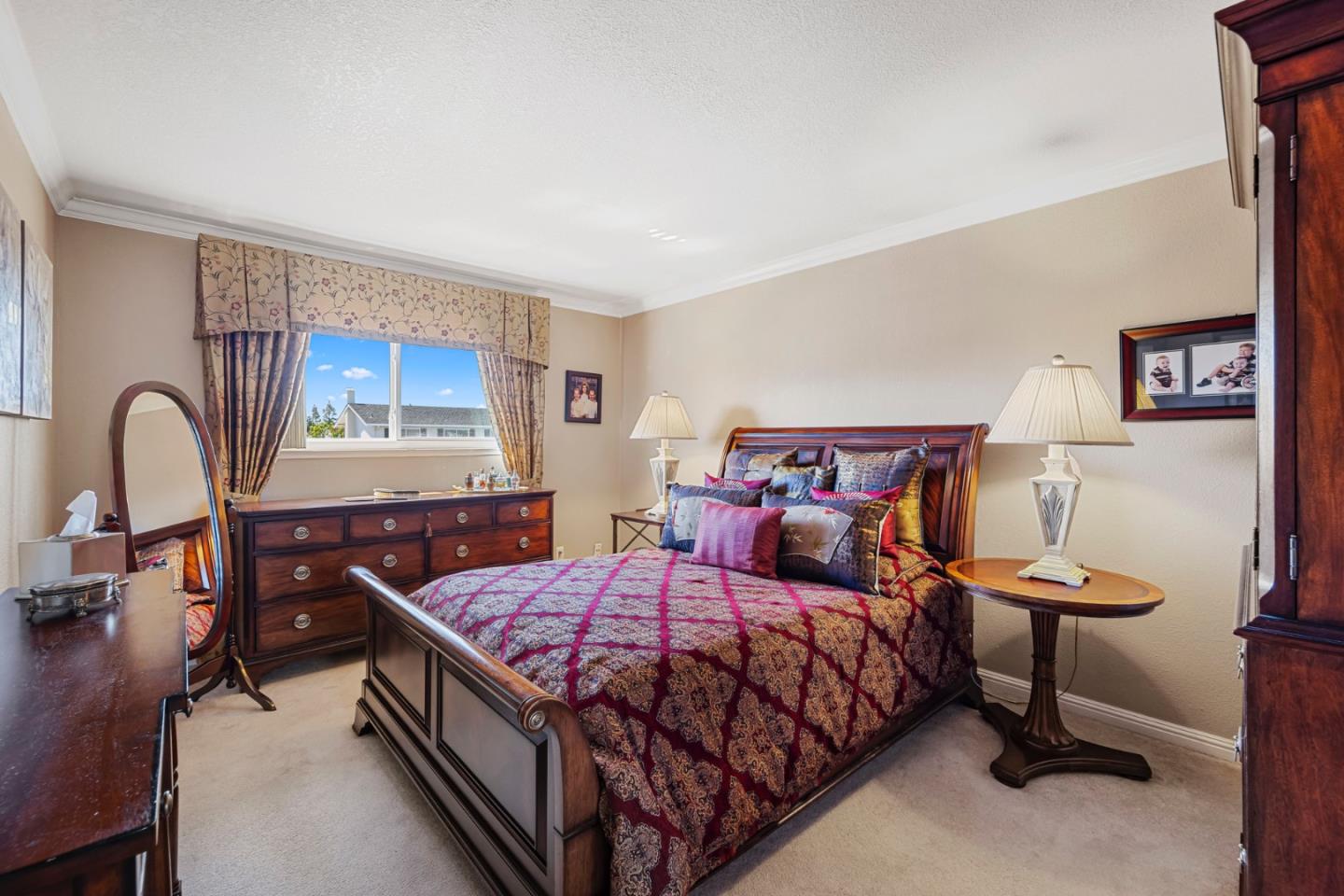 1272 Stardust Way Milpitas, CA 95035 - Photo 38 of 61 a bedroom with a bed and a dresser in it