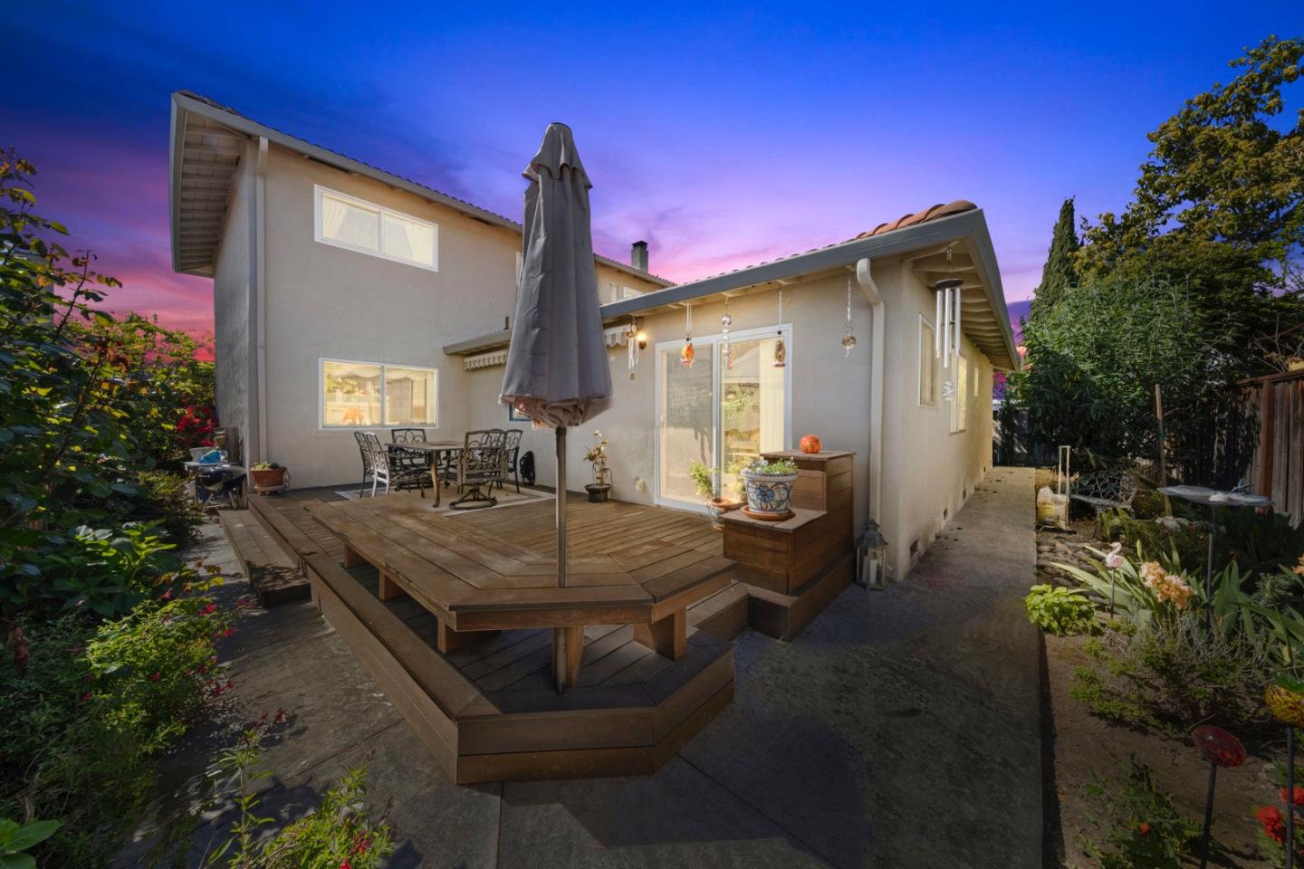 1272 Stardust Way Milpitas, CA 95035 - Photo 56 of 61 a backyard of a house with table and chairs