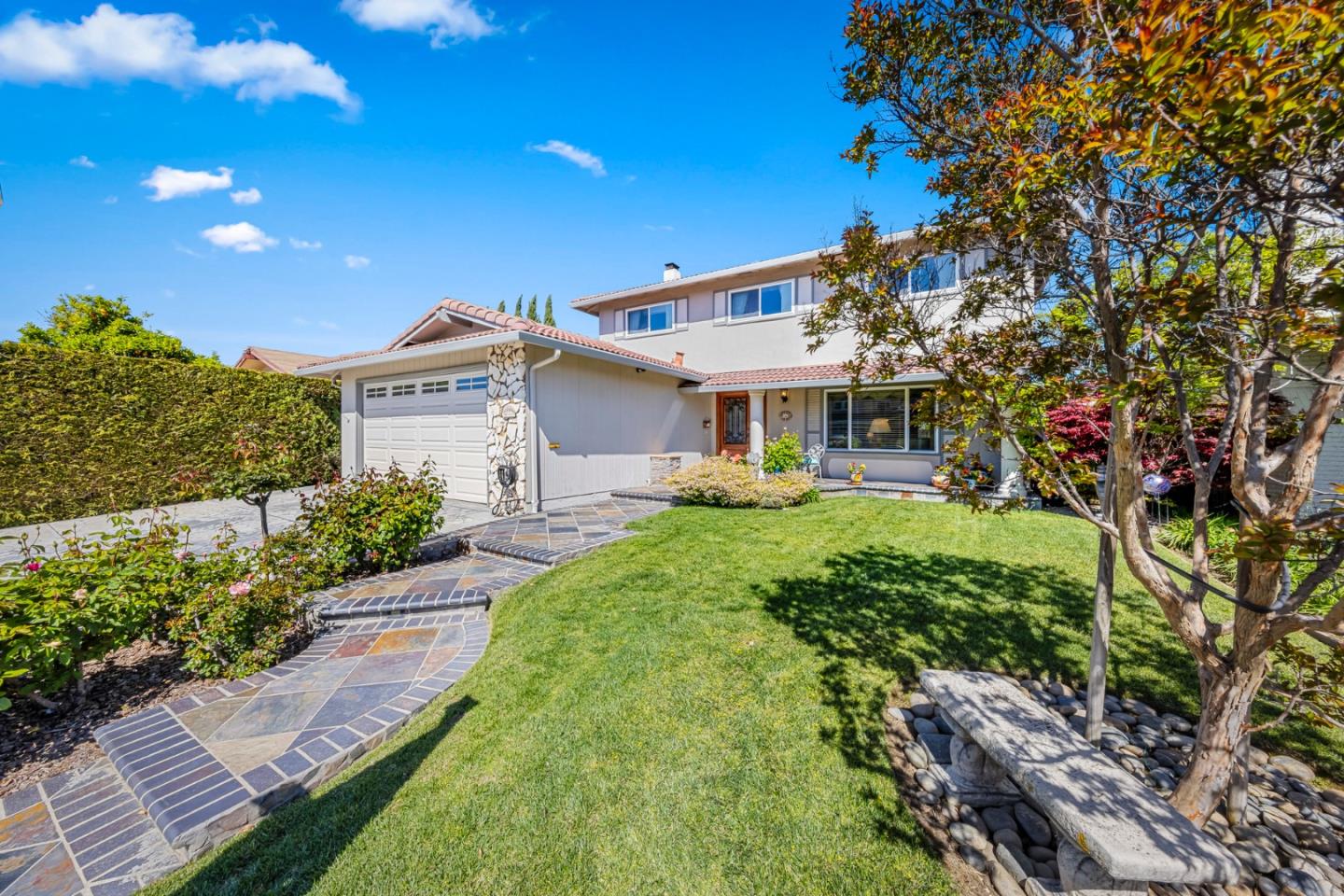 1272 Stardust Way Milpitas, CA 95035 - Photo 6 of 61 a front view of a house with a yard
