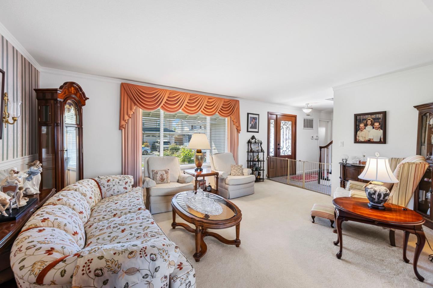 1272 Stardust Way Milpitas, CA 95035 - Photo 10 of 61 a living room with furniture and a large window