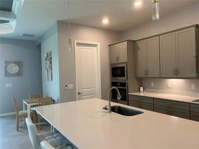 a view of a dining room with furniture
