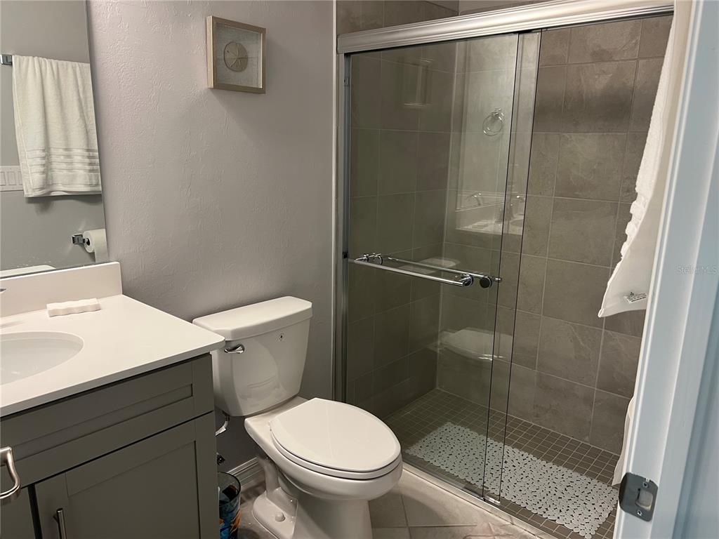 17535 Jadestone Court Venice, FL 34293 - Photo 35 of 92 a white toilet sitting next to a bathroom sink