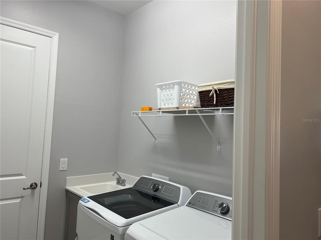 17535 Jadestone Court Venice, FL 34293 - Photo 39 of 92 a utility room with dryer and washer