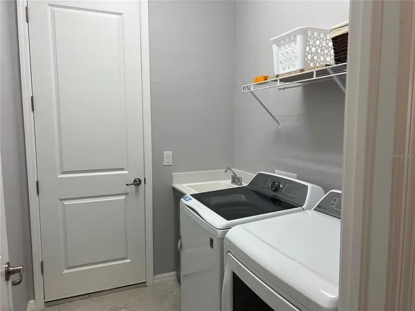 a view of a building with sitting area