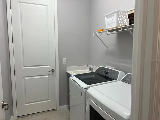 a view of a building with sitting area