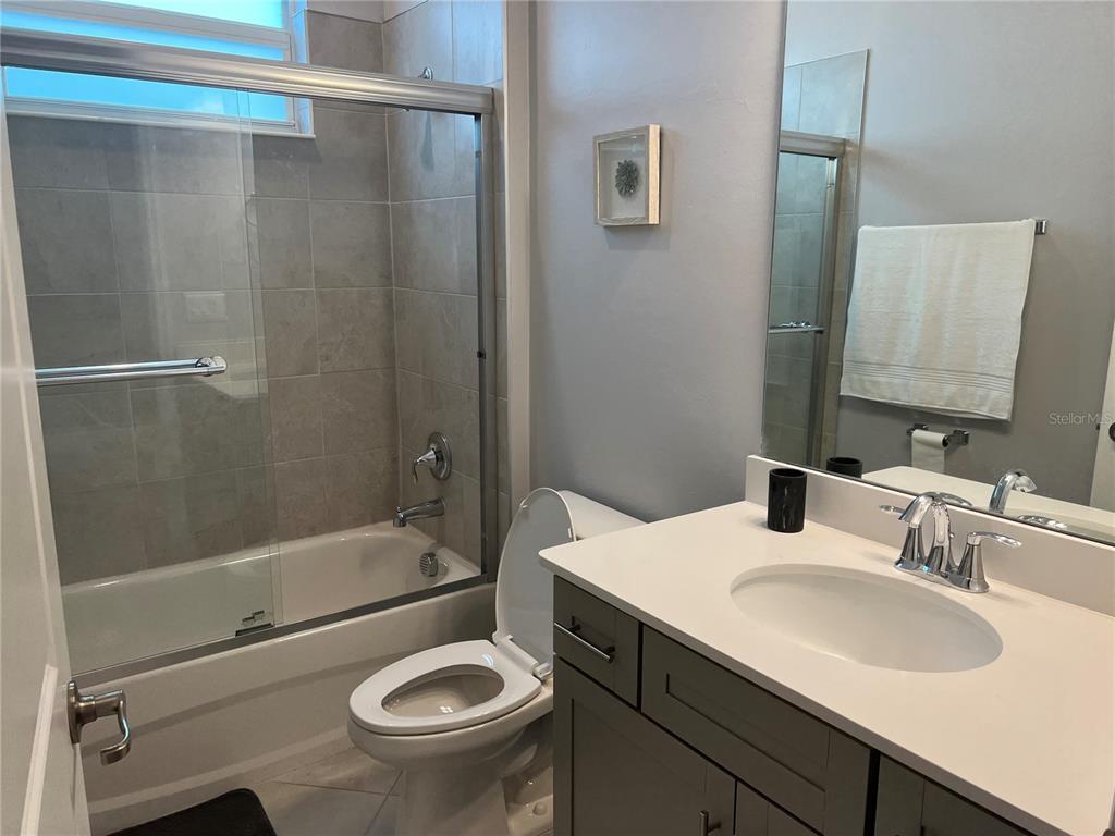 17535 Jadestone Court Venice, FL 34293 - Photo 44 of 92 a bathroom with a sink a toilet and shower