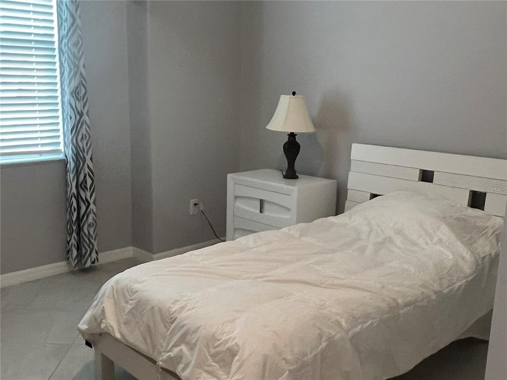 17535 Jadestone Court Venice, FL 34293 - Photo 48 of 92 a large white bed in a white room