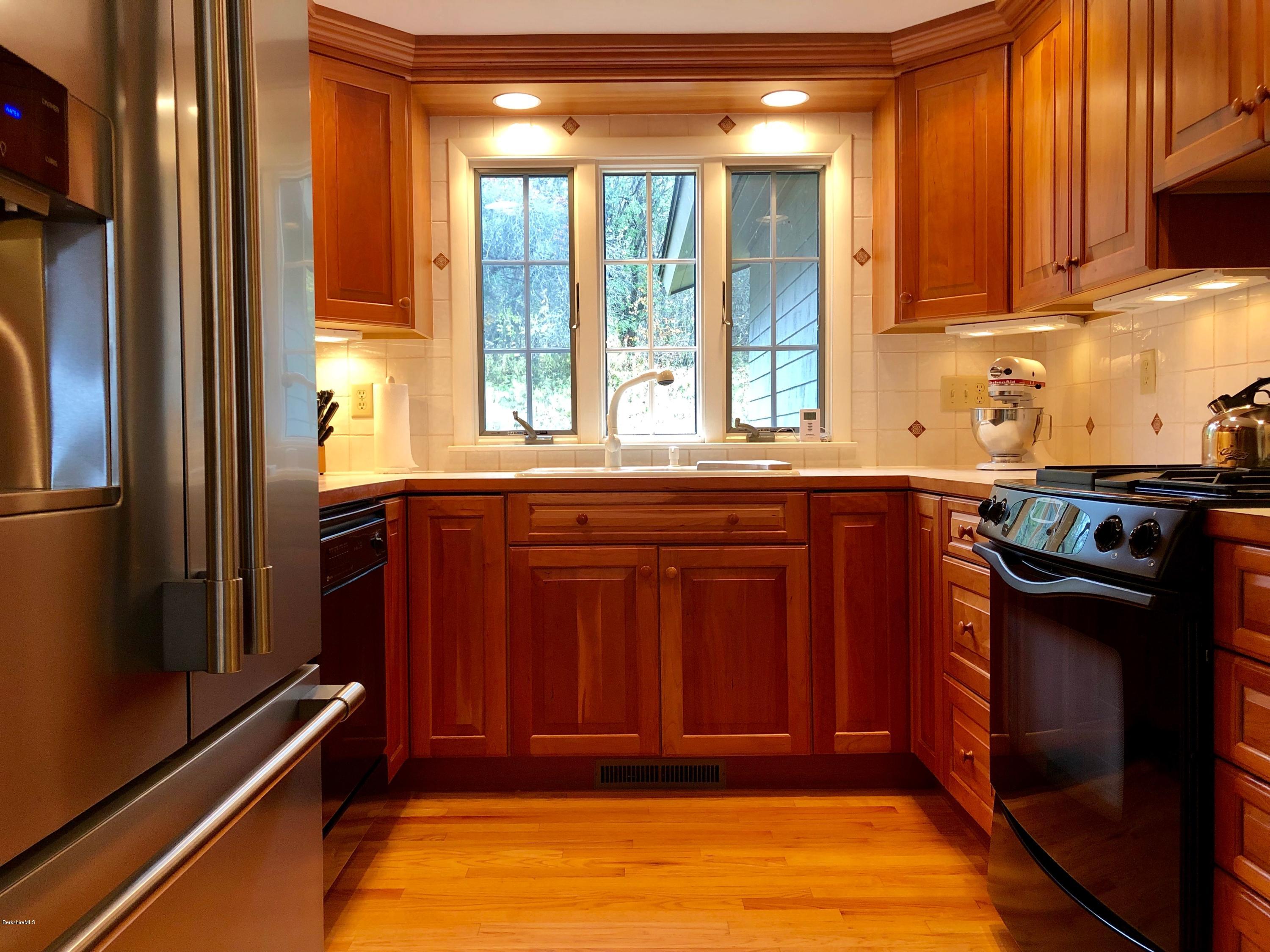 90 Lenox Road West Stockbridge, MA 01266 - Photo 12 of 23 a view of a kitchen with a sink and cabinets