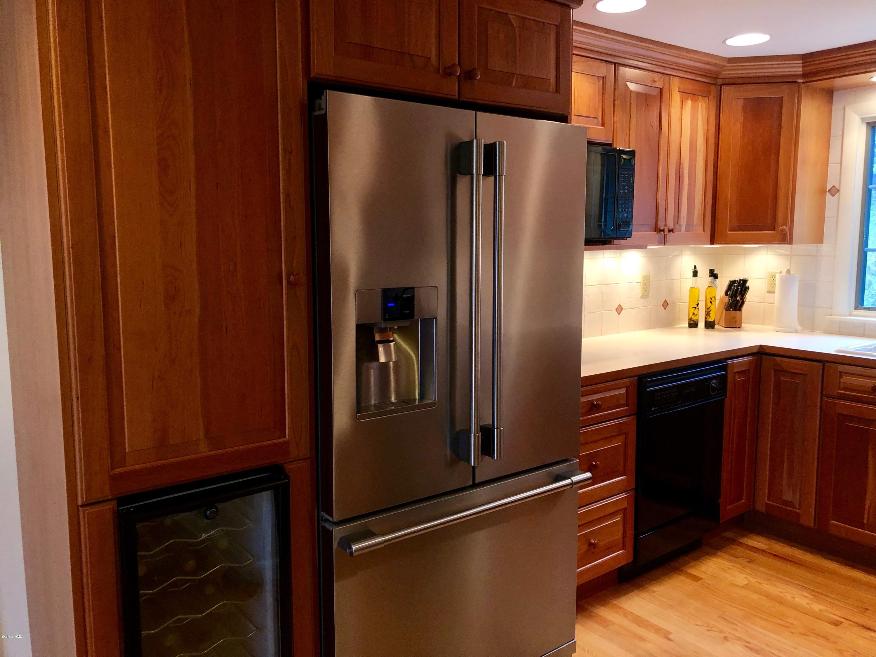 90 Lenox Road West Stockbridge, MA 01266 - Photo 13 of 23 a kitchen with stainless steel appliances granite countertop a refrigerator and a sink