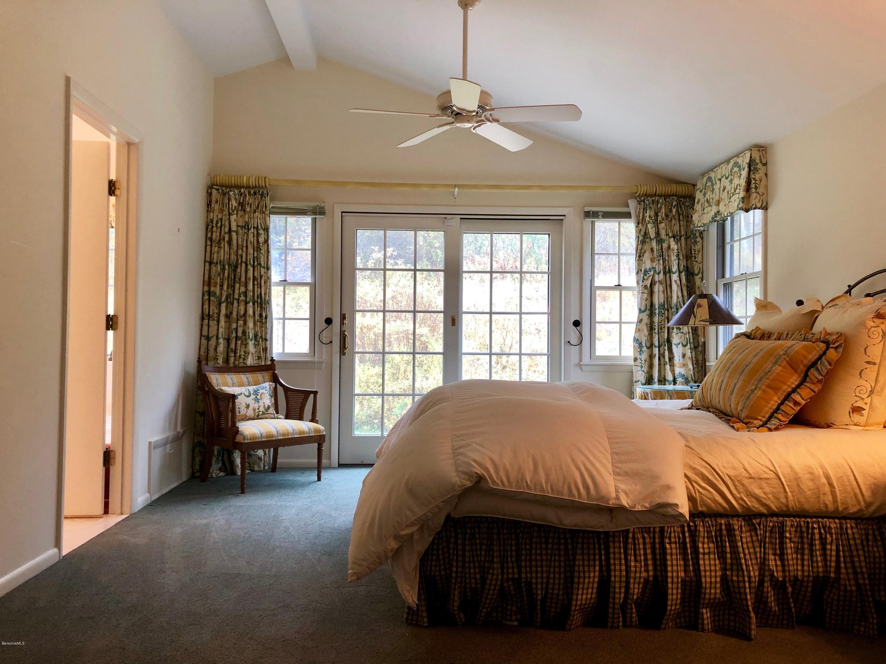 90 Lenox Road West Stockbridge, MA 01266 - Photo 15 of 23 a bedroom with a bed and a couch