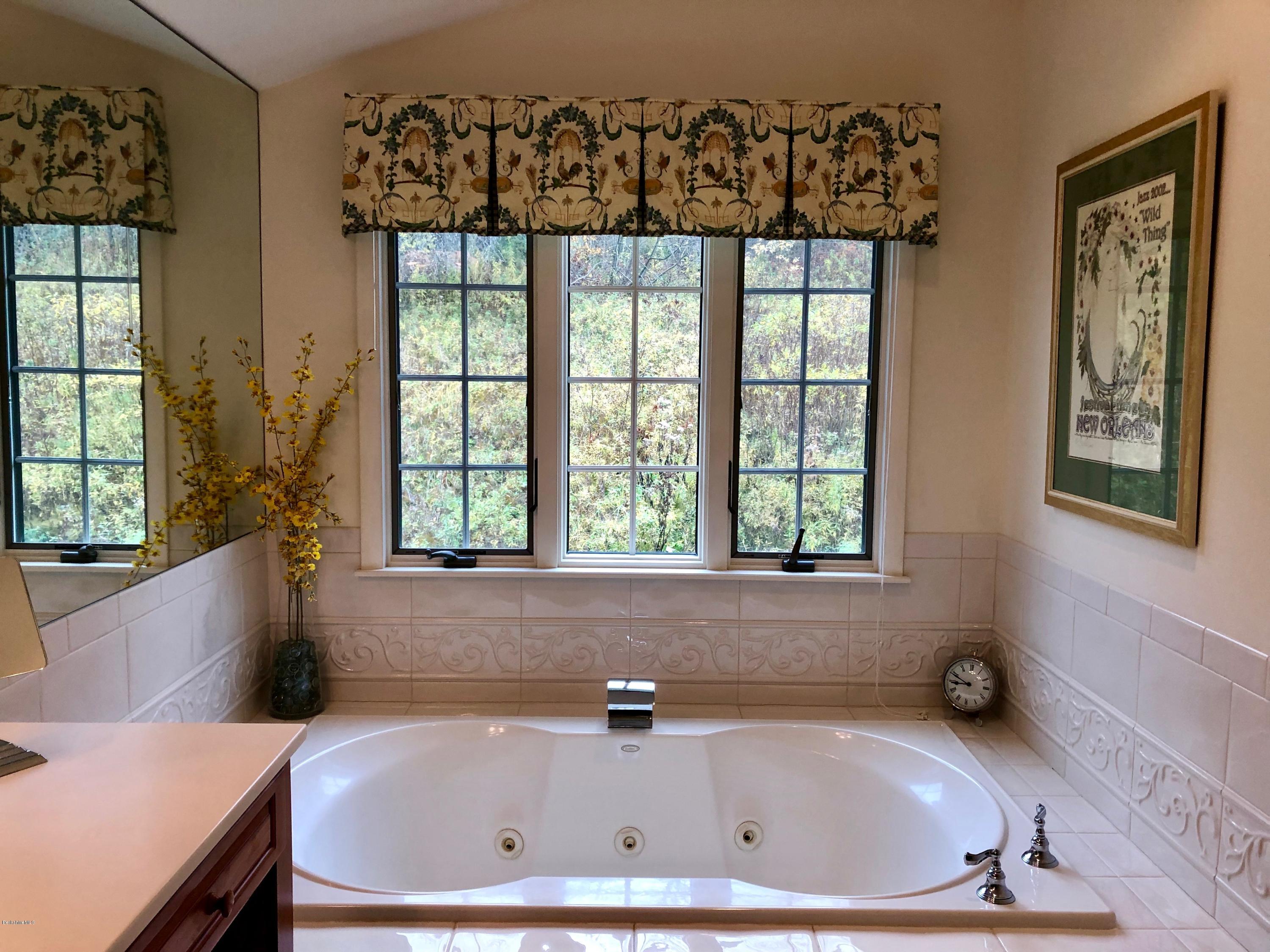 90 Lenox Road West Stockbridge, MA 01266 - Photo 16 of 23 a bathroom with a tub a window and a sink