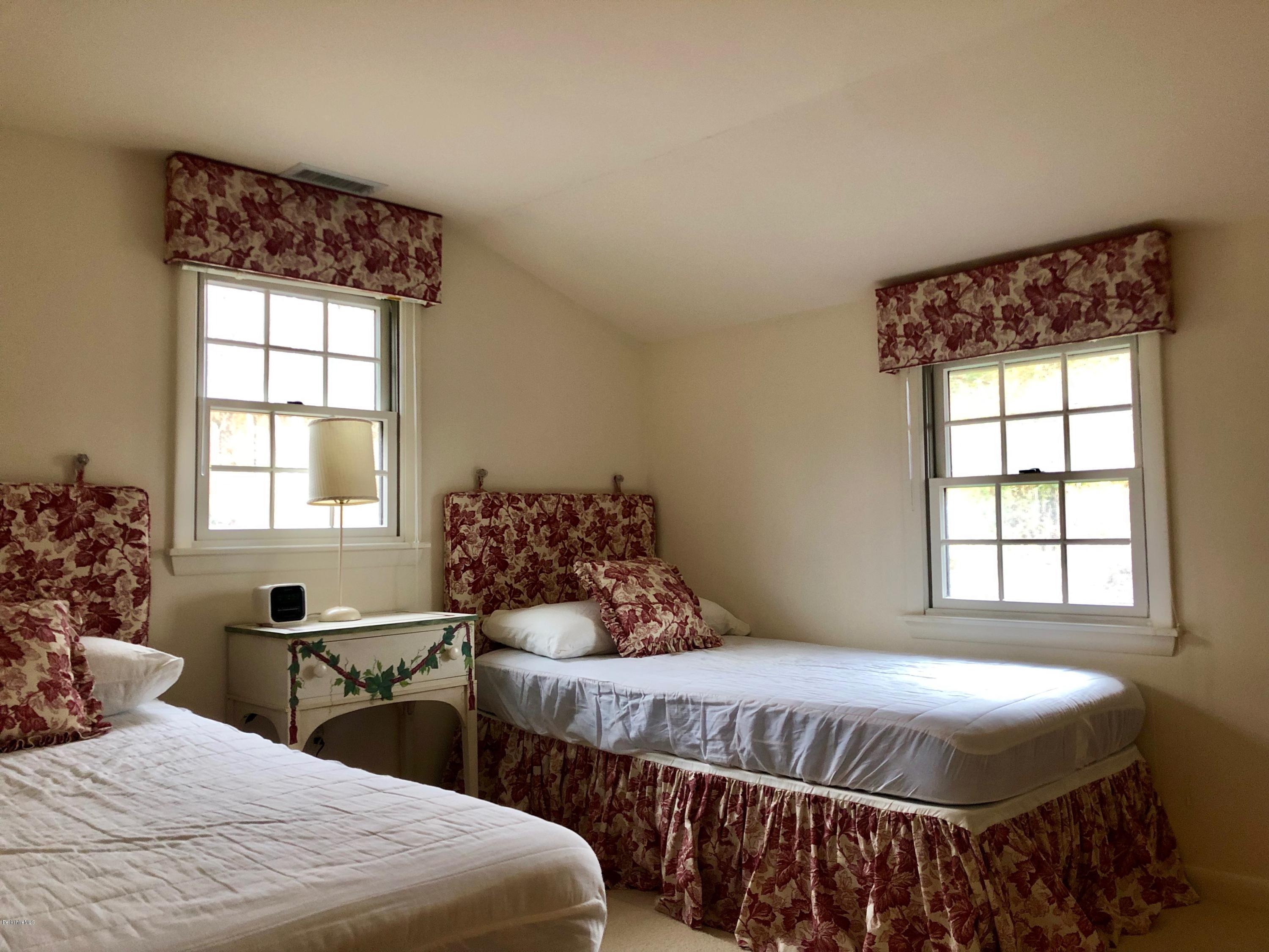 90 Lenox Road West Stockbridge, MA 01266 - Photo 18 of 23 a bedroom with a bed and a window