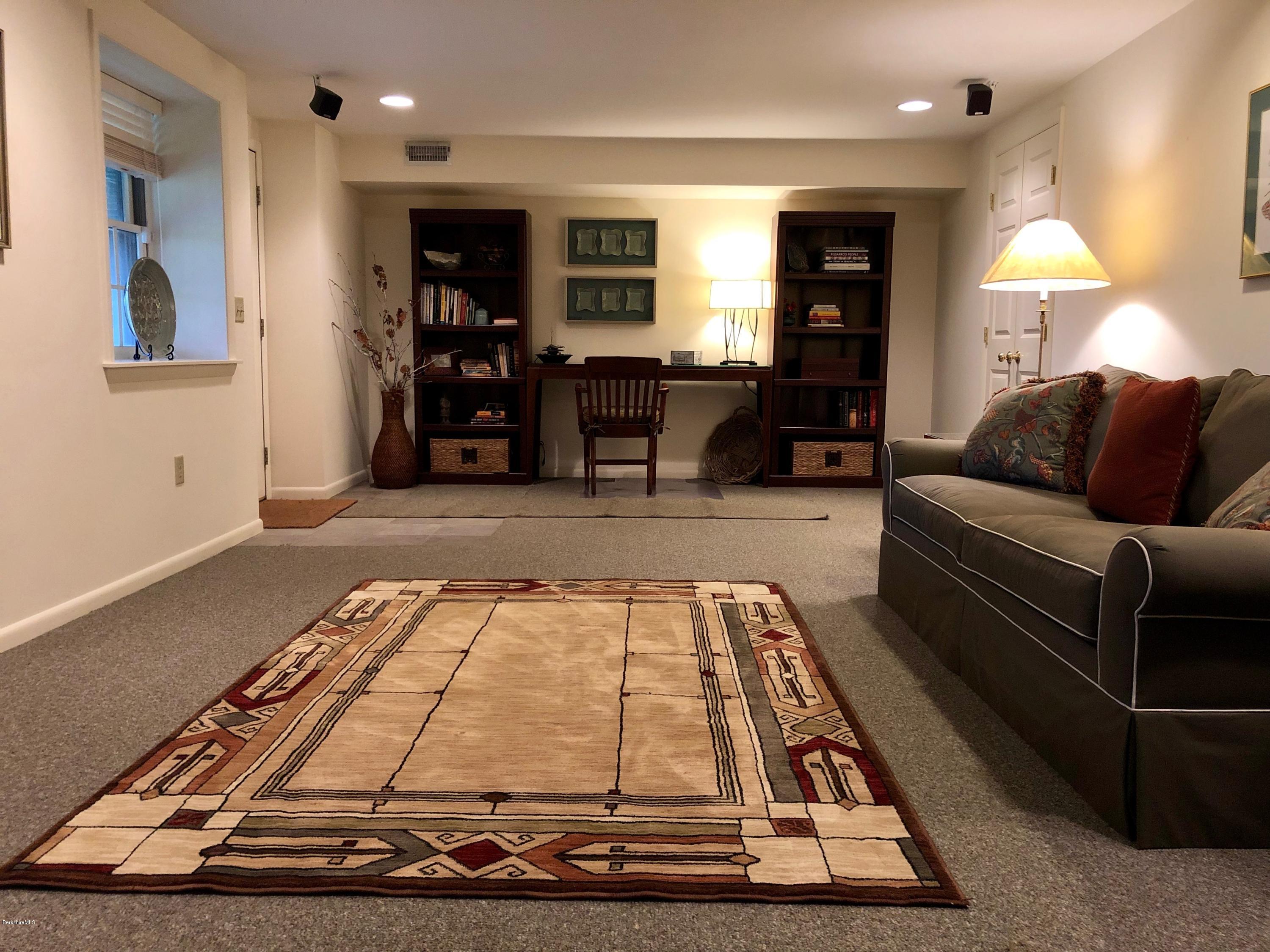 90 Lenox Road West Stockbridge, MA 01266 - Photo 22 of 23 a living room with furniture and a fireplace
