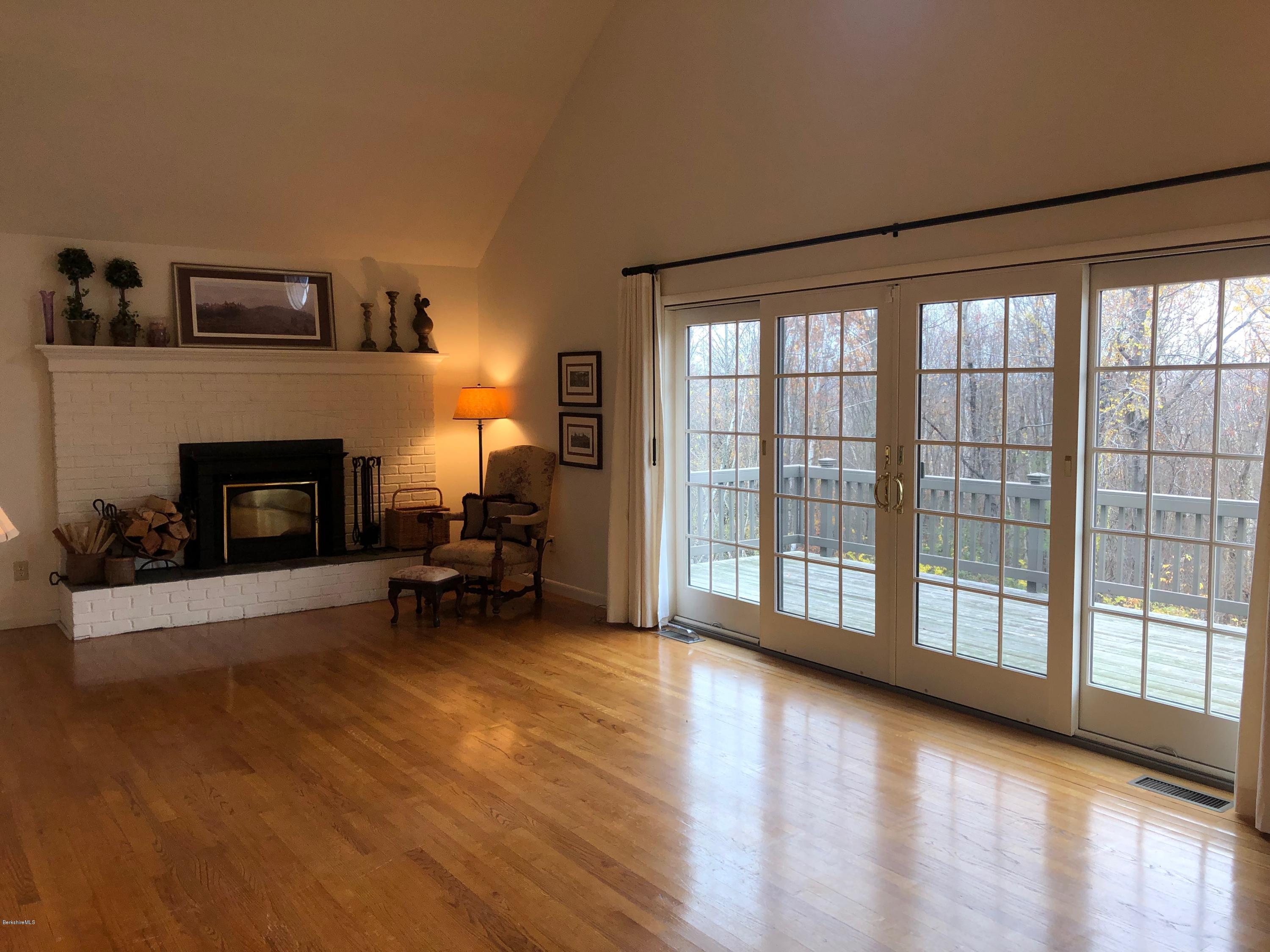90 Lenox Road West Stockbridge, MA 01266 - Photo 6 of 23 a view of a livingroom with furniture and a fireplace