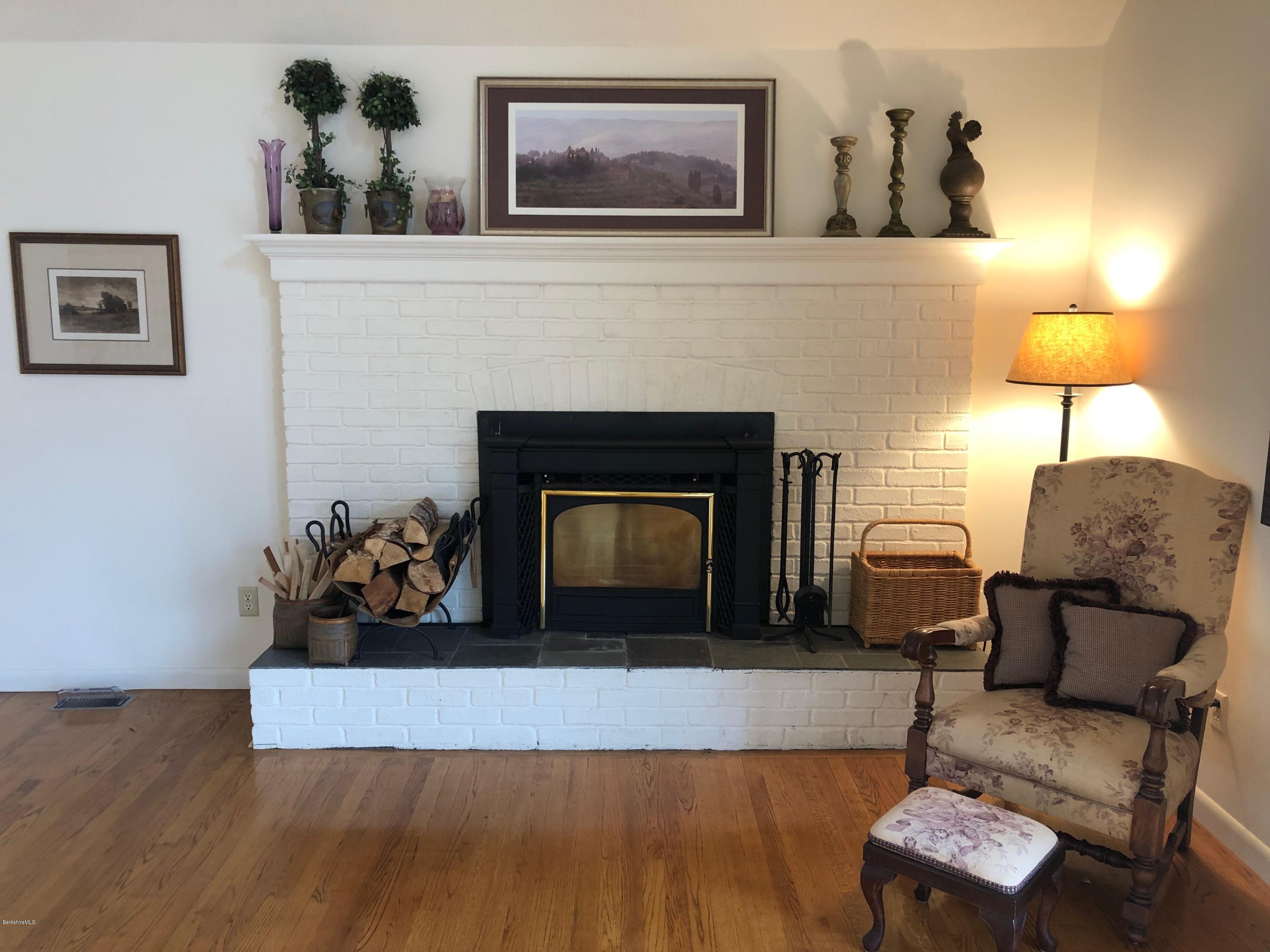 90 Lenox Road West Stockbridge, MA 01266 - Photo 7 of 23 a living room with furniture and a fireplace
