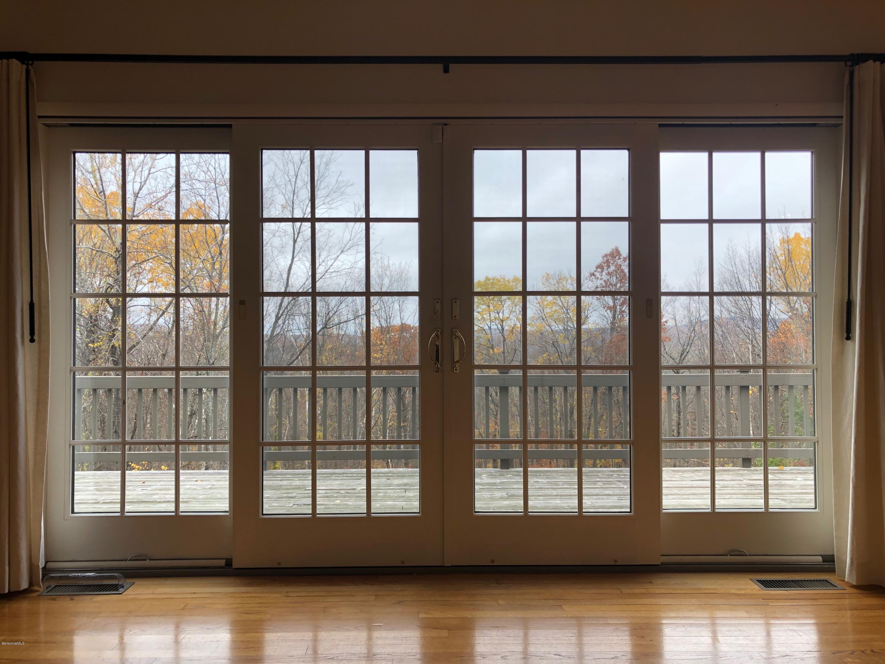 90 Lenox Road West Stockbridge, MA 01266 - Photo 8 of 23 a view of an empty room with a window
