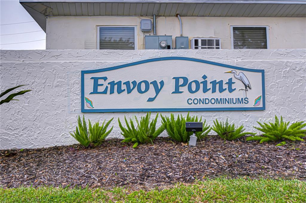 7100 Sunset Way, Unit 505 St. Pete Beach, FL 33706 - Photo 27 of 28 a sign on the side of a building