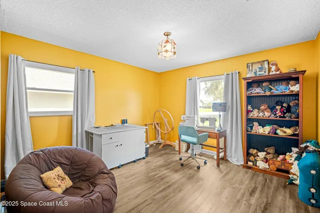 a view of a livingroom with furniture