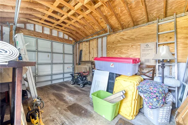 a view of a chairs and table in a patio