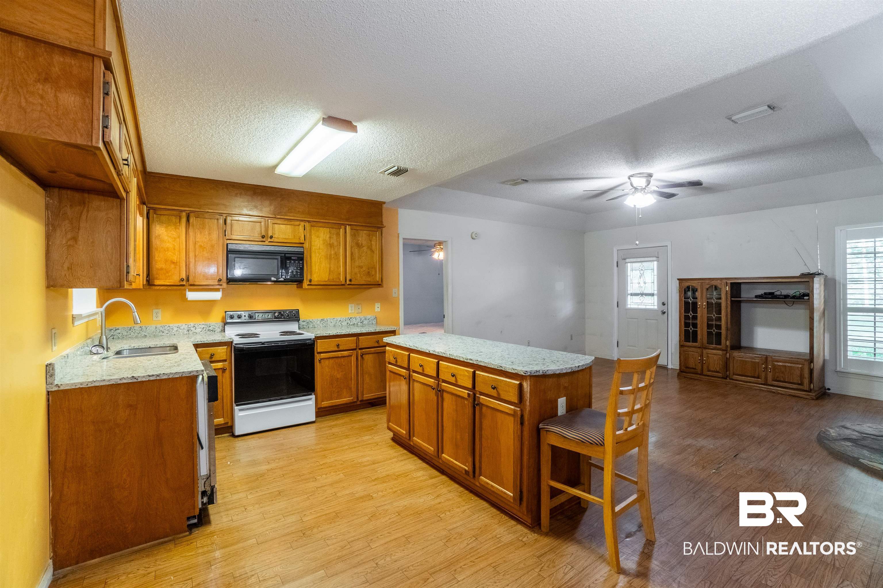 10349 Longview Drive West Foley, AL 36535 - Photo 17 of 35 Kitchen with light hardwood / wood-style floors, sink, electric stove, and ceiling fan