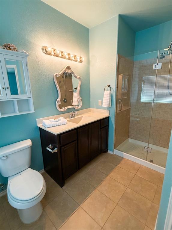 120 Chalk Road Anna, TX 75409 - Photo 5 of 24 Primary bathroom with rimless shower and finishes.