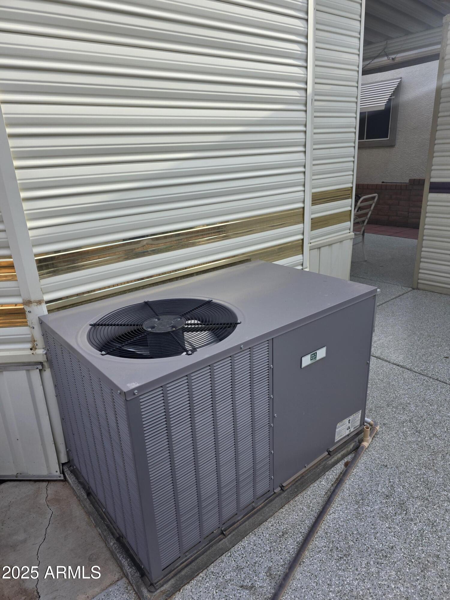 1315 West Chesapeake Avenue, Unit 315 Apache Junction, AZ 85119 - Photo 4 of 10 a kitchen with a cabinets and white appliances