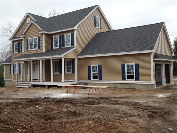 11 Checkerberry Lane Chelmsford, MA 01824 - Photo 2 of 10 a front view of a house with a yard