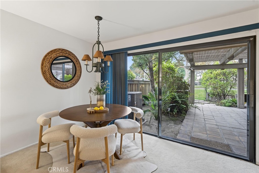 513 Pebble Beach Place Fullerton, CA 92835 - Photo 17 of 42 a dining room with furniture and a window
