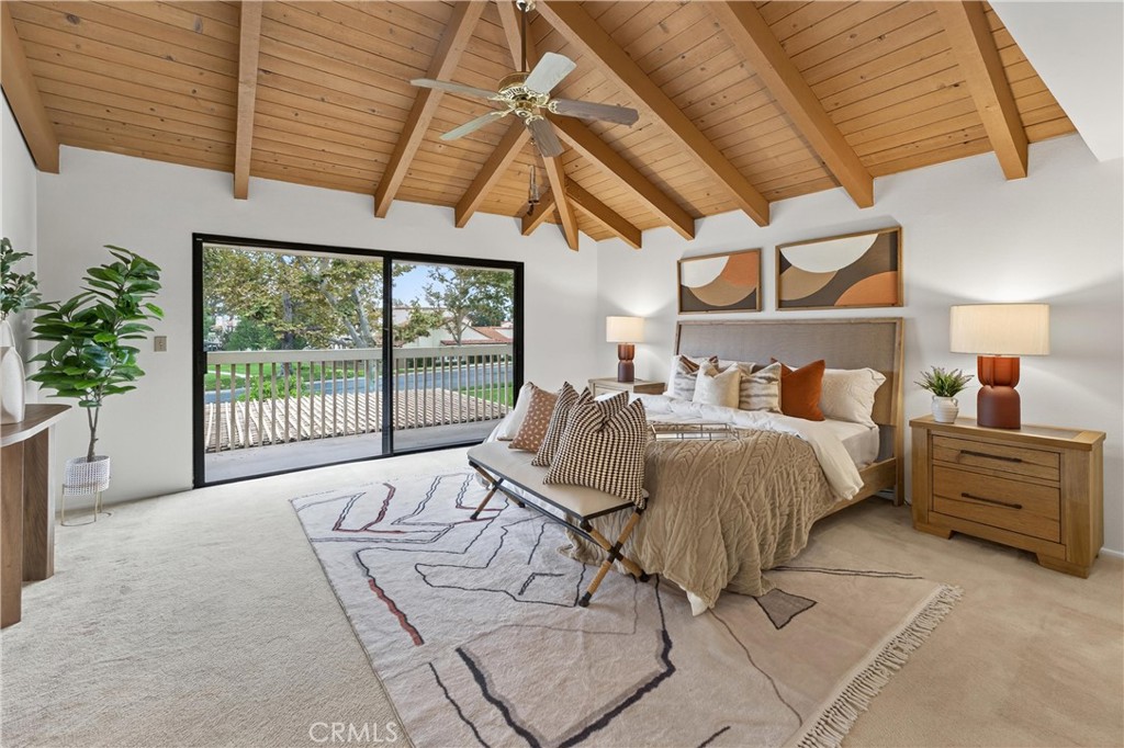 513 Pebble Beach Place Fullerton, CA 92835 - Photo 18 of 42 a bed sitting in a bedroom next to a window