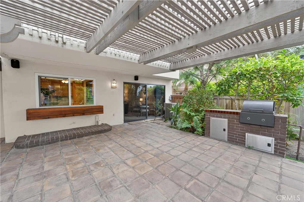 513 Pebble Beach Place Fullerton, CA 92835 - Photo 29 of 42 a view of a porch with furniture and a backyard