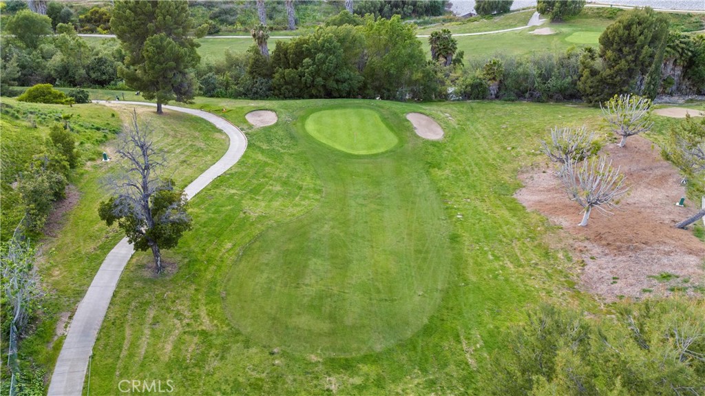 513 Pebble Beach Place Fullerton, CA 92835 - Photo 34 of 42 a view of a golf course with a swimming pool