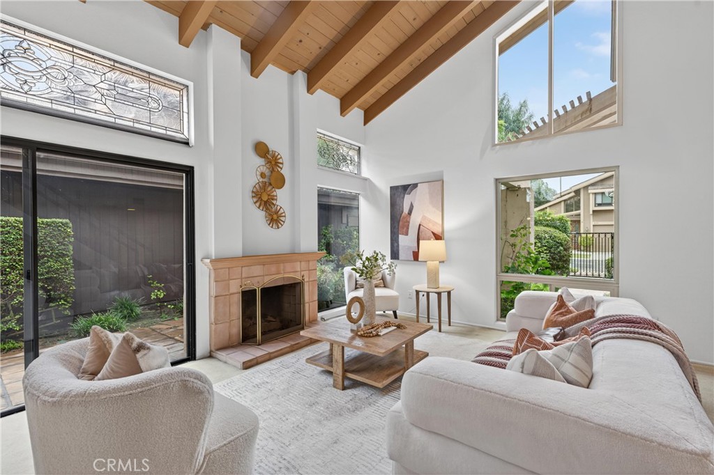 513 Pebble Beach Place Fullerton, CA 92835 - Photo 5 of 42 a living room with furniture and a fireplace