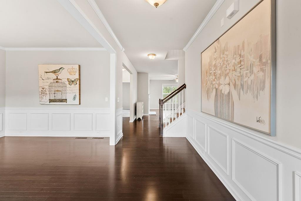 2415 Matlin Way Buford, GA 30519 - Photo 4 of 66 a view of an entryway with wooden floor