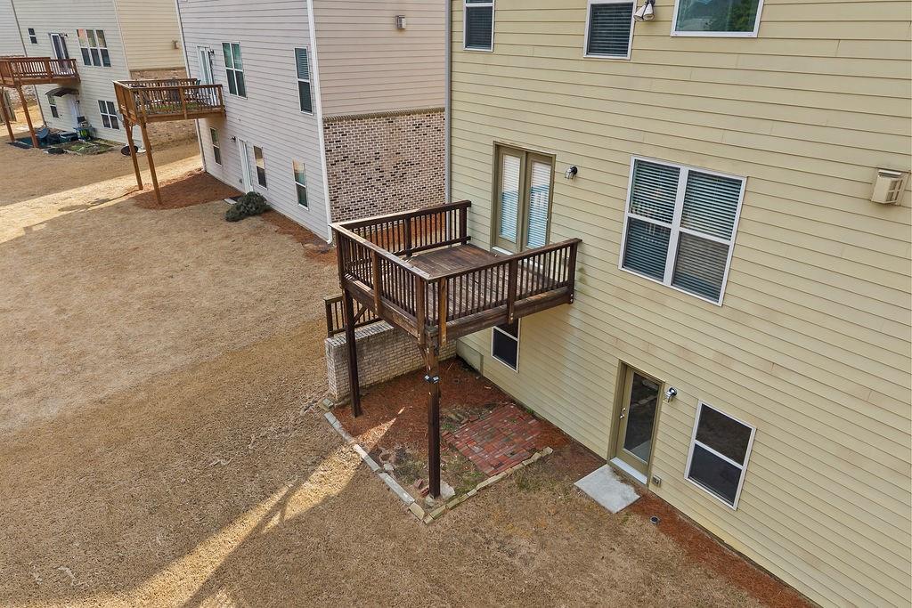 2415 Matlin Way Buford, GA 30519 - Photo 53 of 66 a building outdoor space with porch
